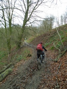 Graham climbing through Manners Wood. 