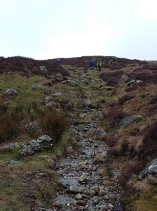 Choosing a line on the steep final descent to Llyn Cowlyd. 