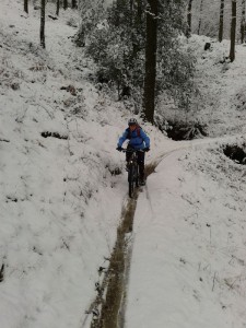 Charlotte on The North Face Trail singletrack.