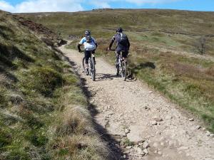 Laurence and Paul climbing the Pennine Bridleway from Widdop Reservoir.