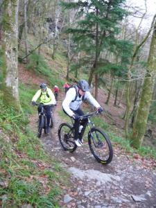 Tony and Martin climbing the Parc a reid singletrack at the start of the Gwydir Mawr trail.