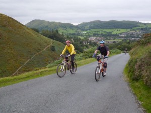 Colin and Dan on the long and steep road climb from Church Stretton.