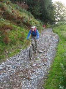 Ian on the fast and rocky Blaen y cwm descent.                    