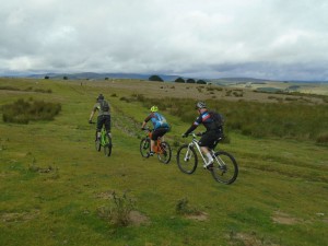 Brian, Matty and Steve following the ruts across Pen y Gwely.      