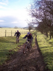 Paul and Jim on the muddy and rutted climb to Llechrydau farm.