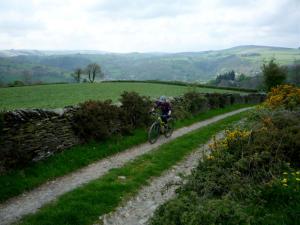 Becky climbing along the Llwydiarth bridleway above the Ceiriog Valley.