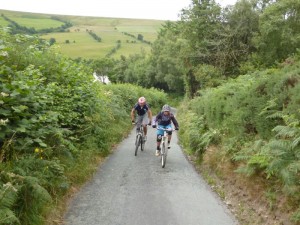 Pete and Mark climbing the lane from Bryn Awel, above the Ceiriog Valley.    
