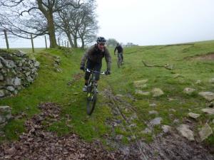 Nigel and Mike on the muddy Moel Eithinen trail.