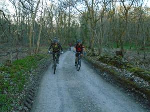 Brian and Rob riding through Big Wood.