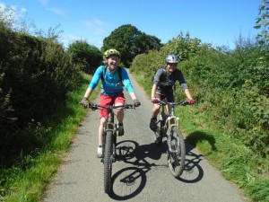 Kylie and Becky on lane to the Ffrith descent.