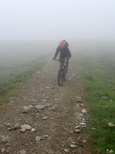 Mark climbing Raise in the clouds, heading to the summit of Helvellyn. 