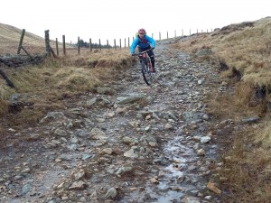 Graham starting the technical and boulder strewn Garburn Pass descent.