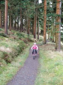 Anna on the first singletrack climb of the Alwen Reservoir cycle trail.