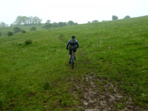 Dan climbing a sodden Wormhill. 