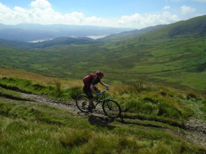 Graham on the Braich traverse with views over the Mawddach Estuary.