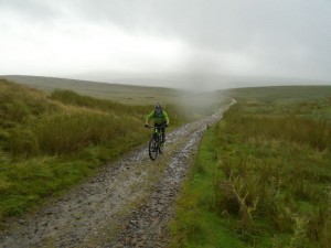 Brian climbing to the Churn Milk Hole junction below Pen-y-ghent.