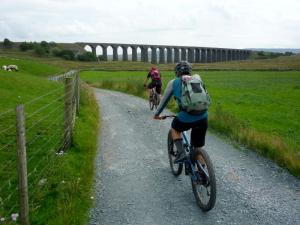 Jake and Wayne approaching the Ribblehead Viaduct.