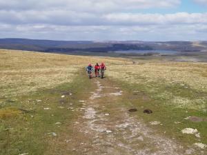 Mark, James and Steve on the climb to Kirkby Fell, with Malham Tarn behind.
